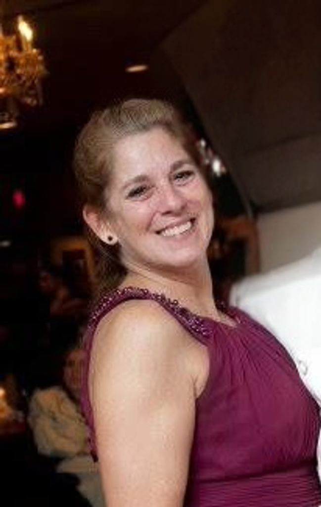 Denise M. Hughes