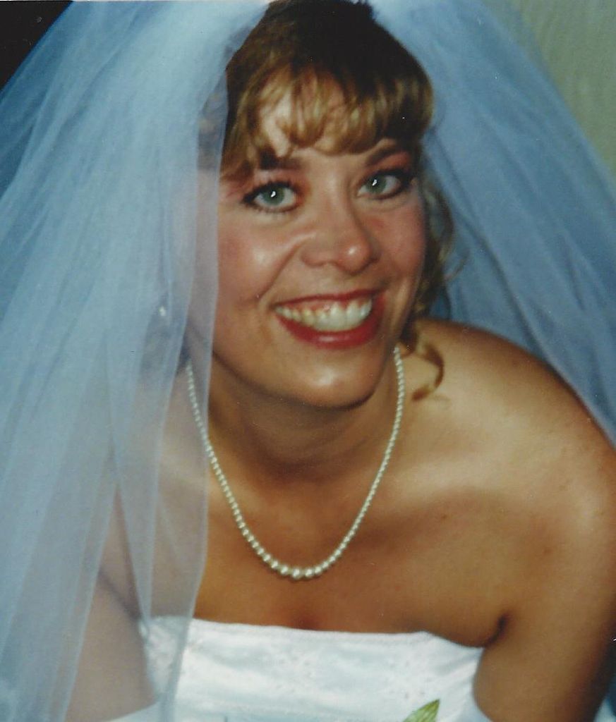 Angela D Traman