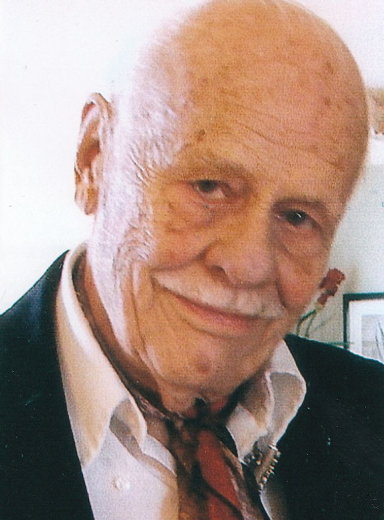 Edmond E. Comartin Jr. Dds