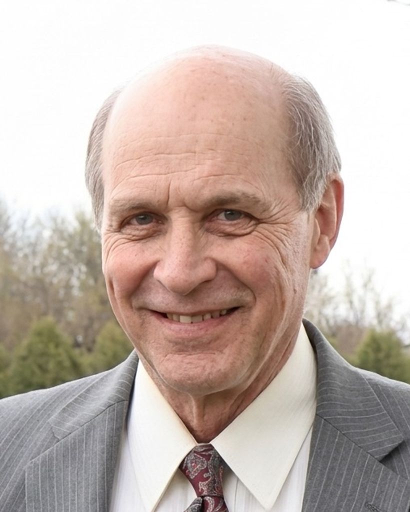 Dennis M. Greising