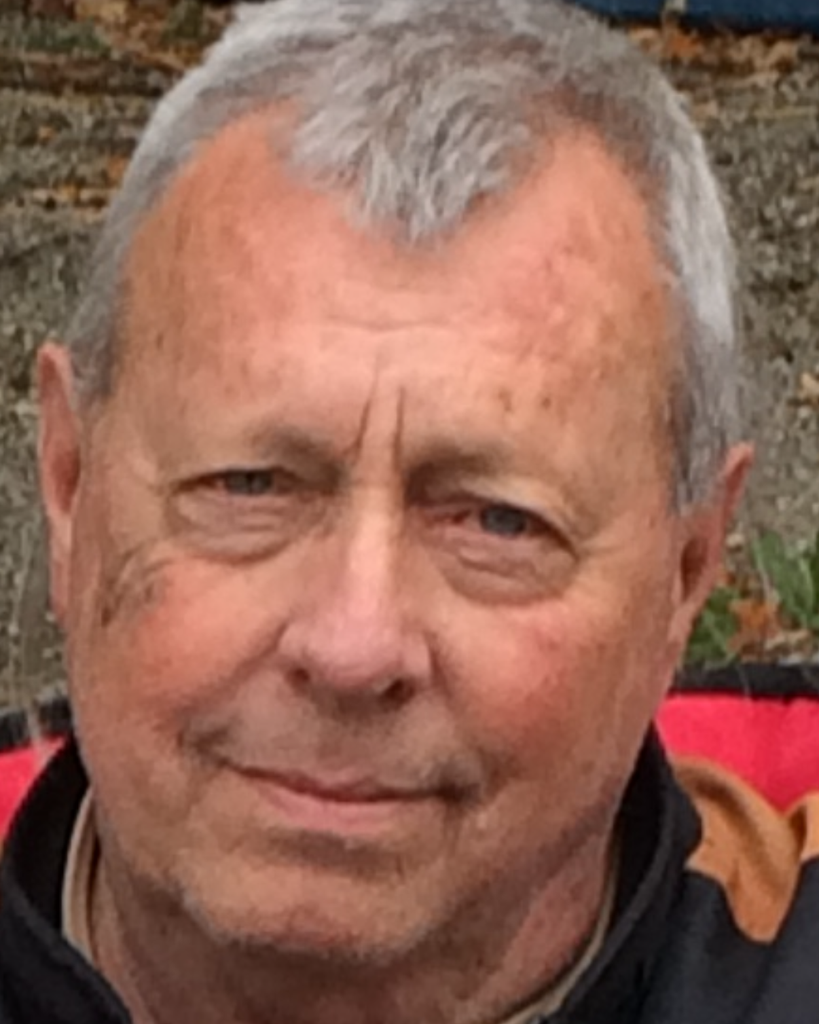 W. "Gene" E. Bennington