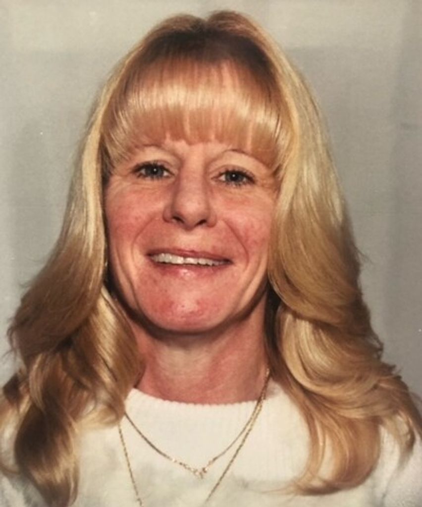 Tracy L. Tavener Evans