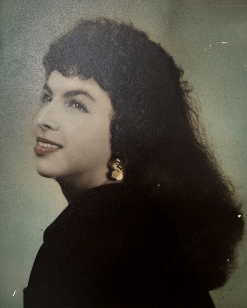 J. Elizabeth Santos