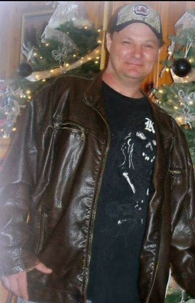 Travis  Mollett
