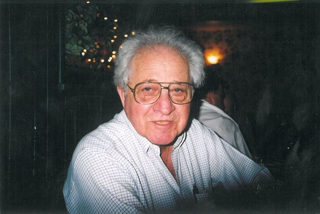 Raymond  E. Valente