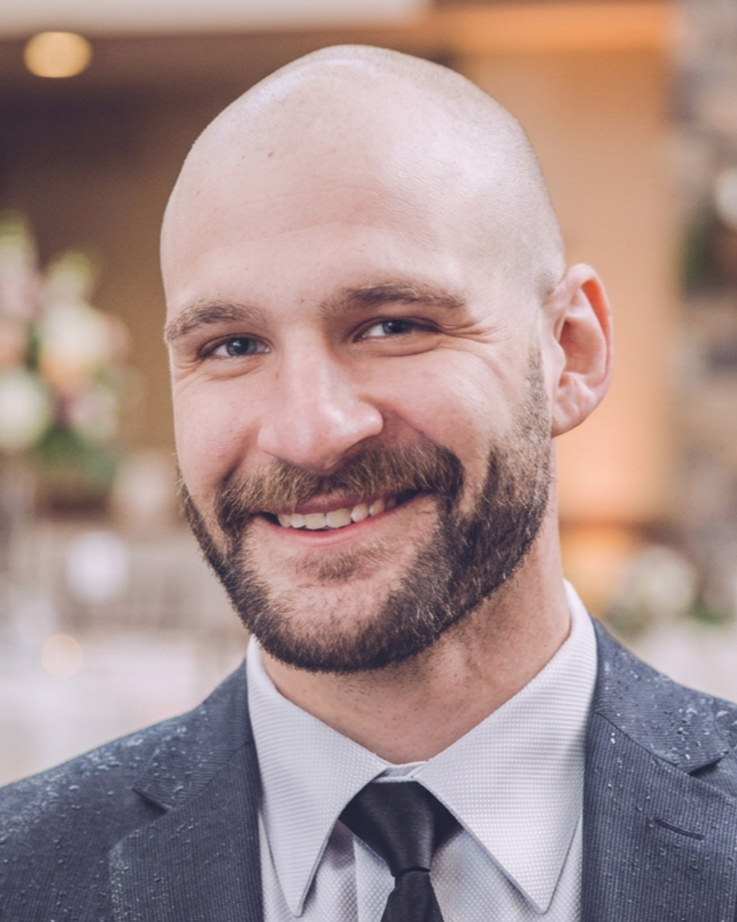 Adam M. Reed
