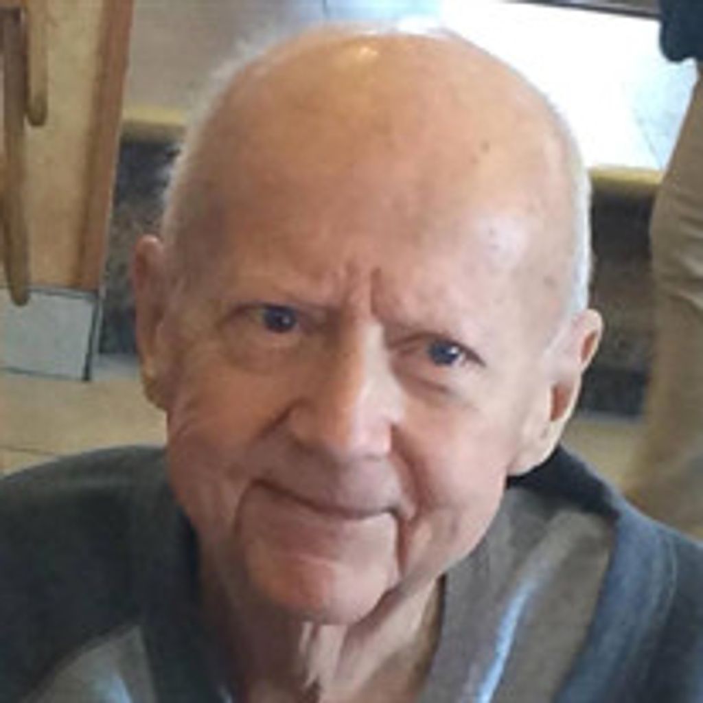 Raymond E. Holthe