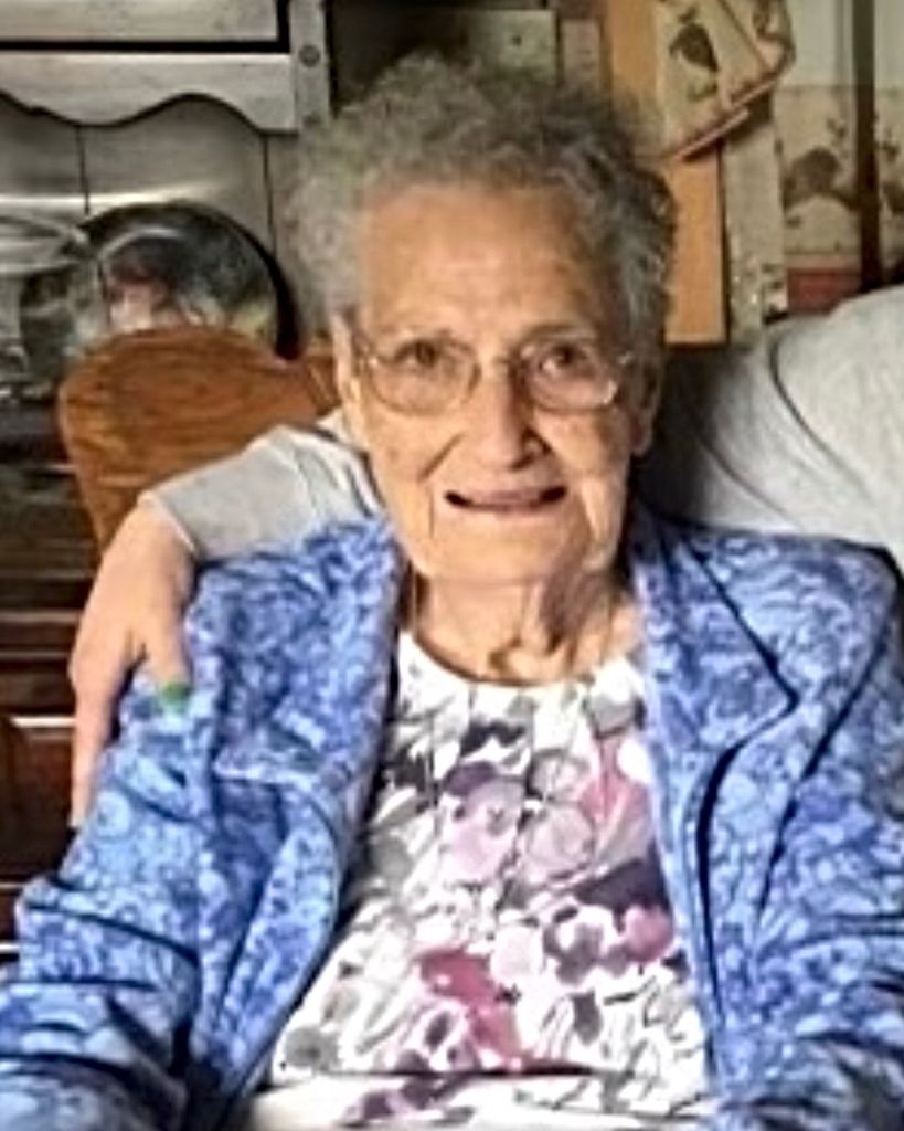 Edith M. WHITE