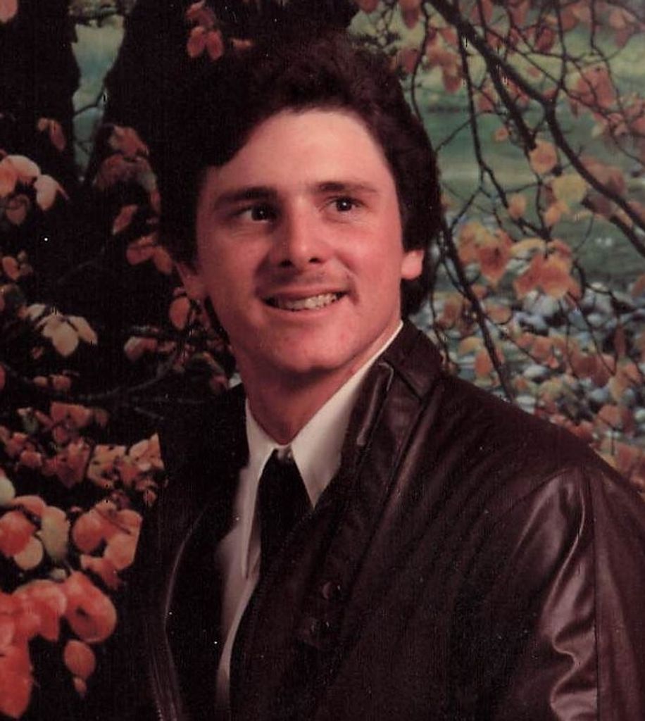 Mark A. Brewer