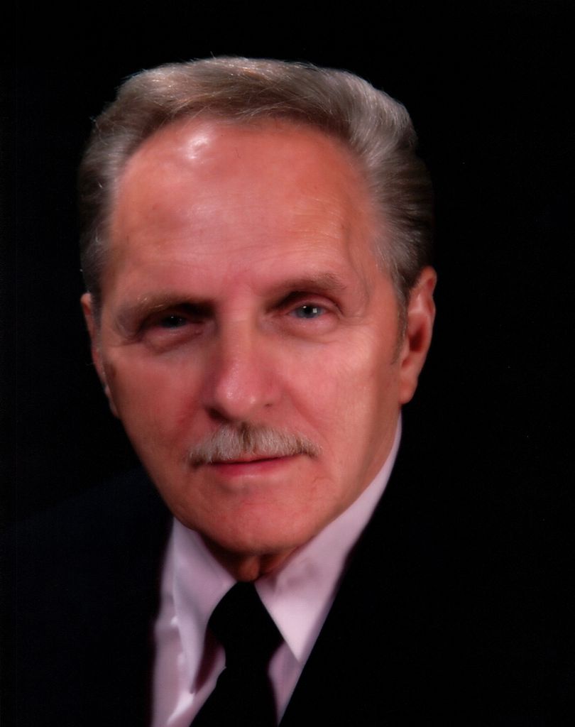 James E Krizek