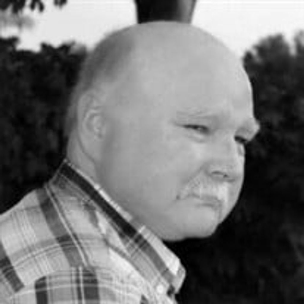 Stanley “Tom” T. Greene