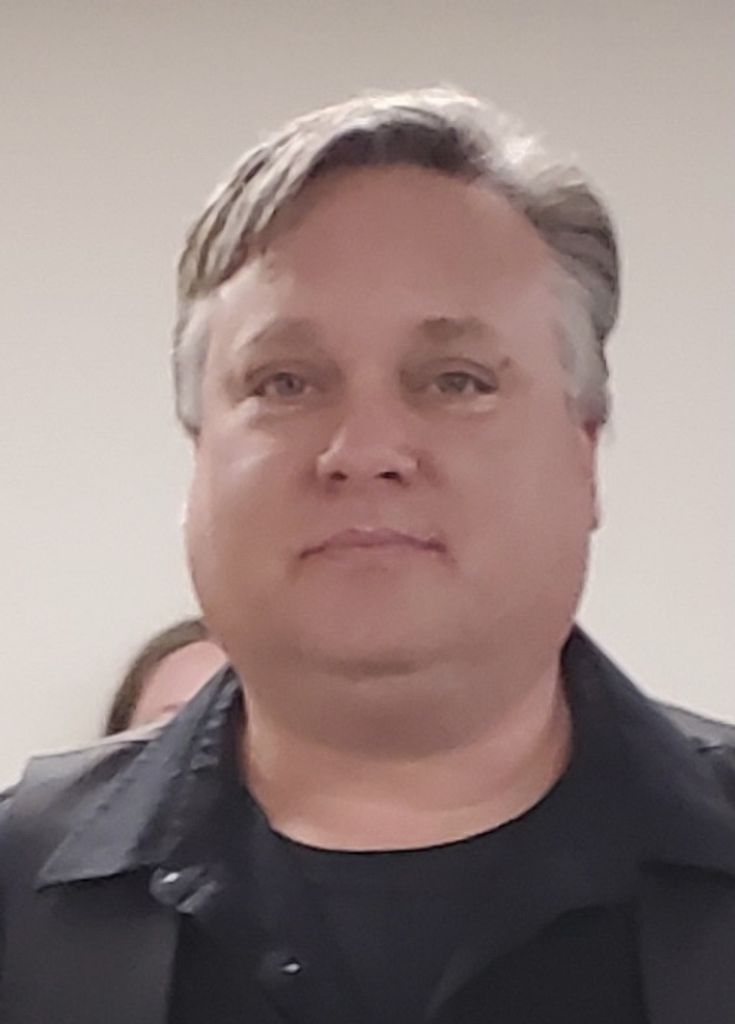 Rev. Russell Houser