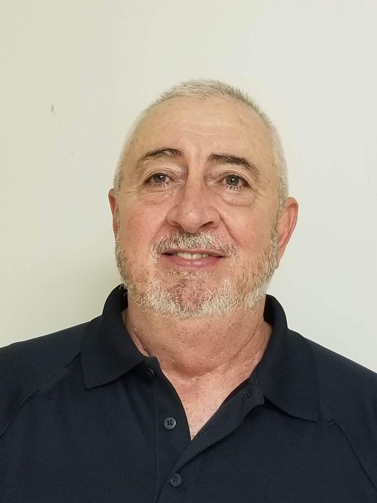 Mark L. Thomas