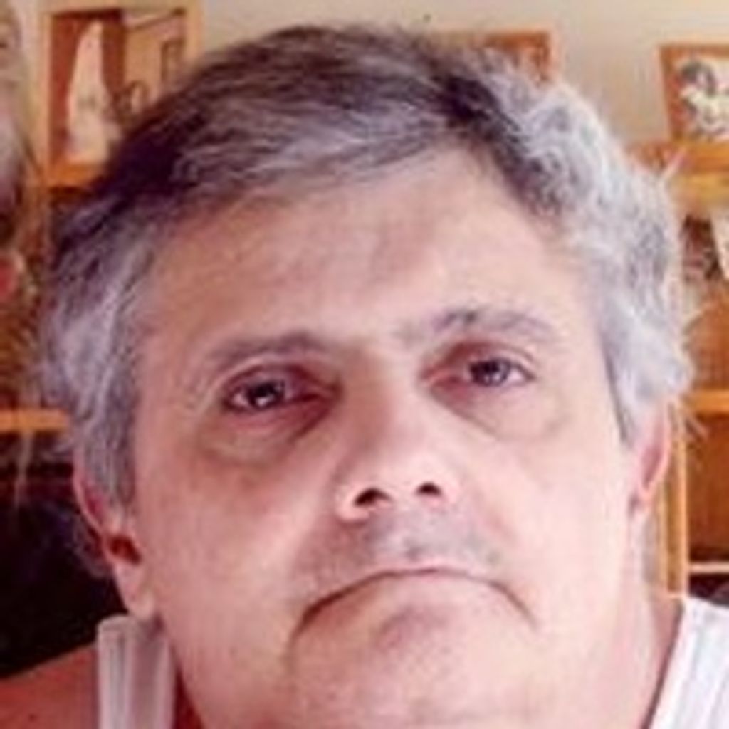 Joe  E. Velho