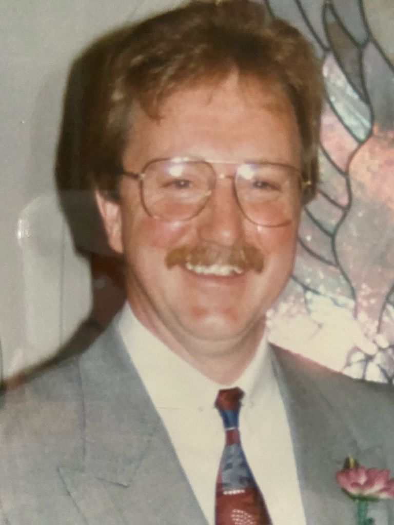 Terrance “Terry” E. Schmelzer