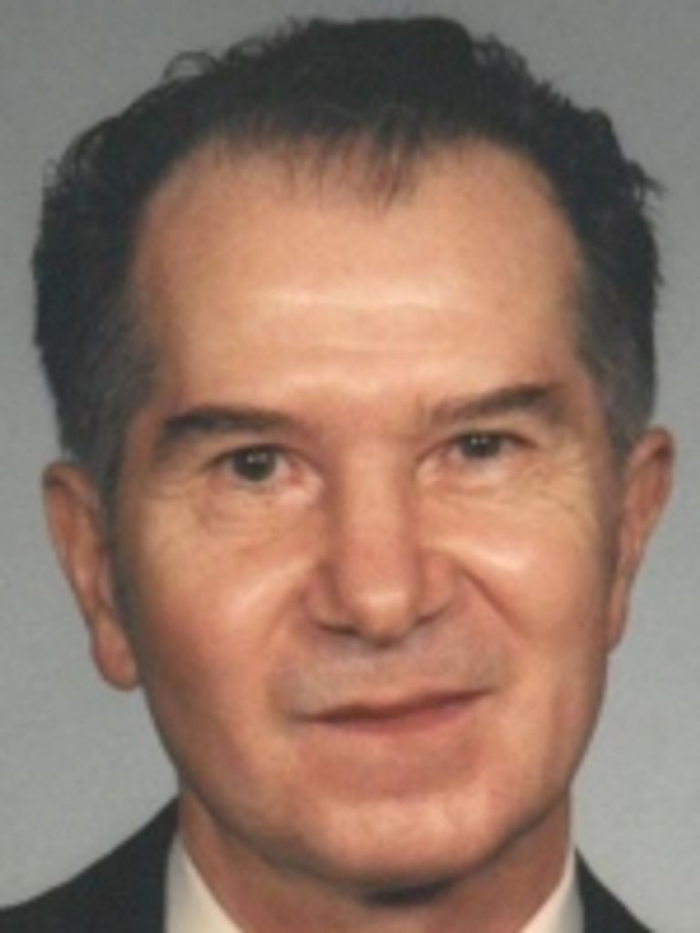 Dr.  Michael Poprik,  Jr