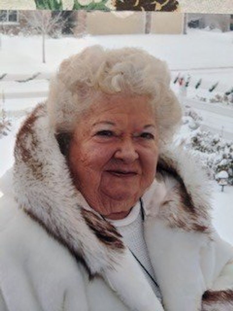 E.  Christine Saccomano