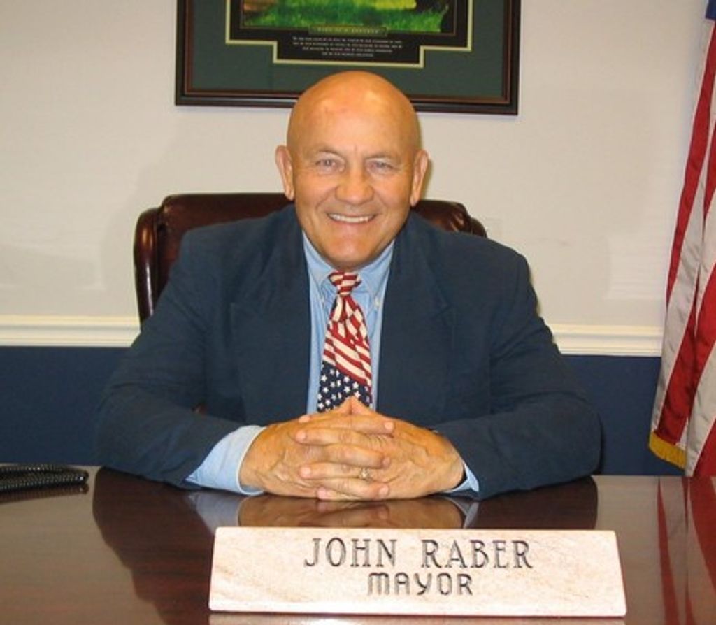 Dr. John Earl Raber
