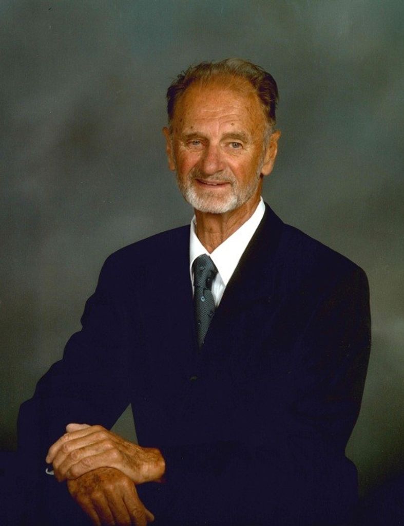 Robert J Navrat