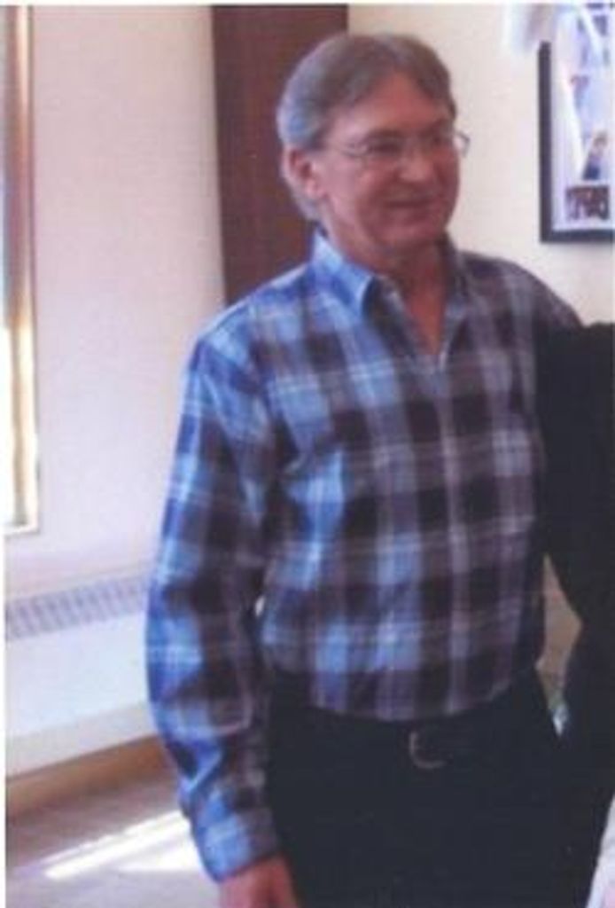 Mark E. Maxam