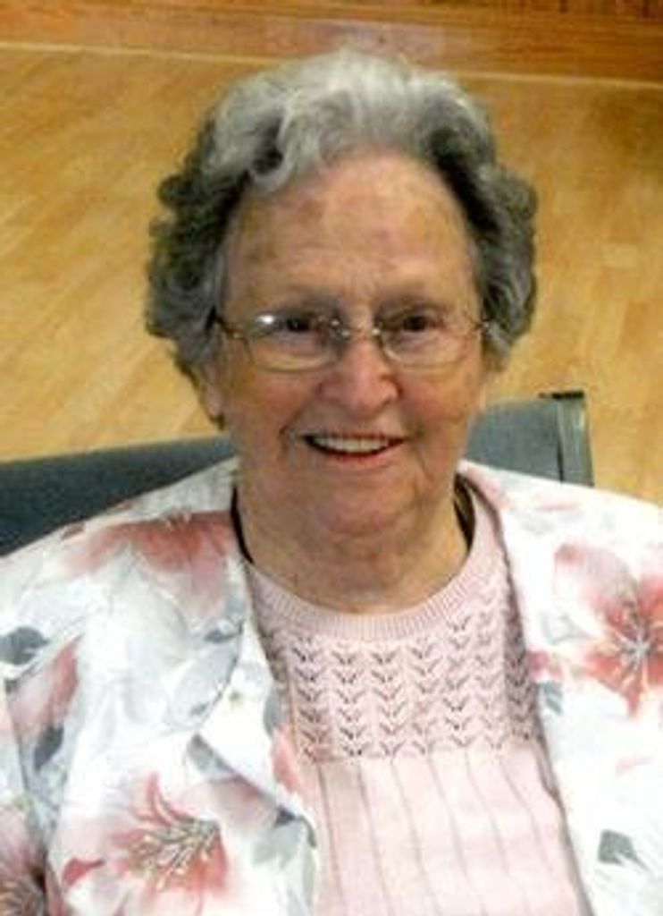 Louise E White