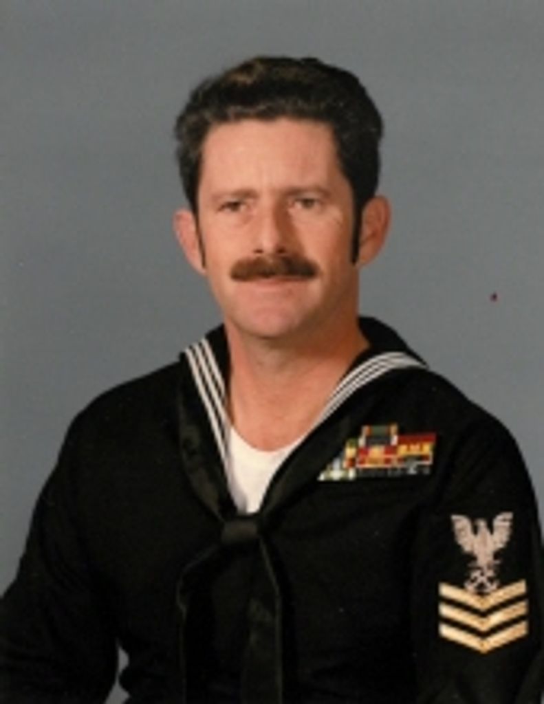 Dennis J Sims