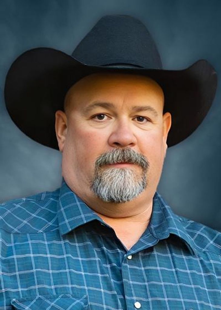Travis E. Johnson