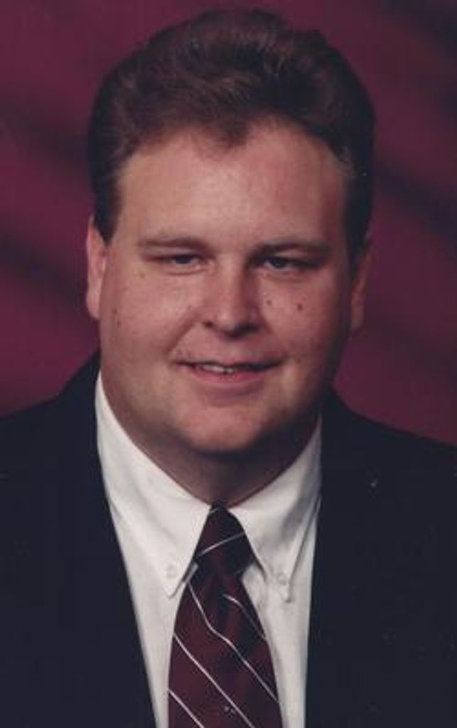 Christopher L. Oakes Profile Photo