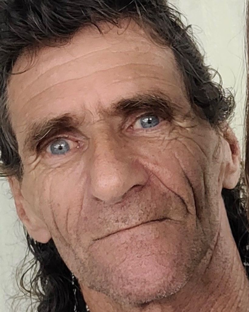 Ernest "Mann" Weekly