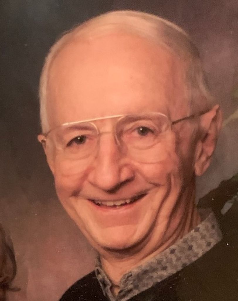 John Komora Jr.