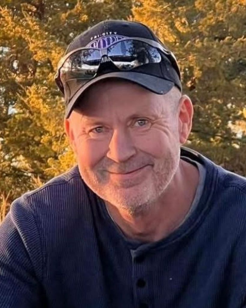 Curtis W Garrison