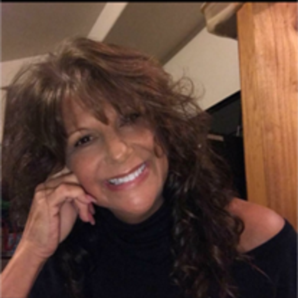 M Elaine Grant