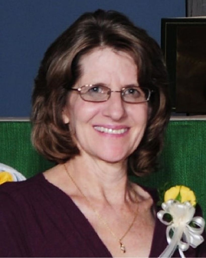 Sandra "Sandi" Moore