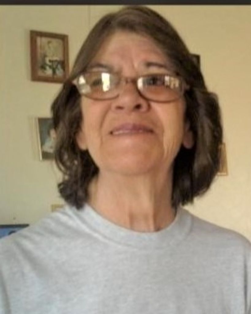 Angela E. Vigil