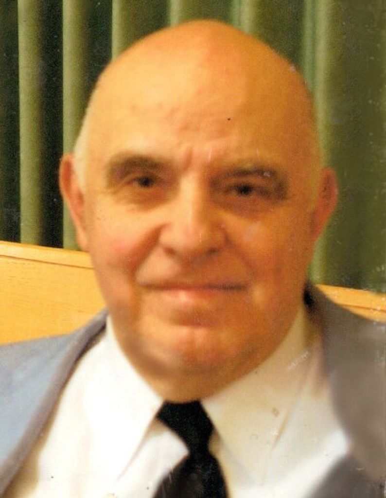 Thomas D Wolf