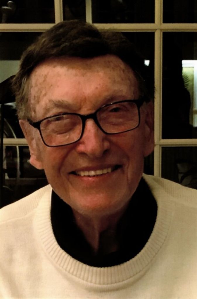 Thomas J. "Tom" Strauss
