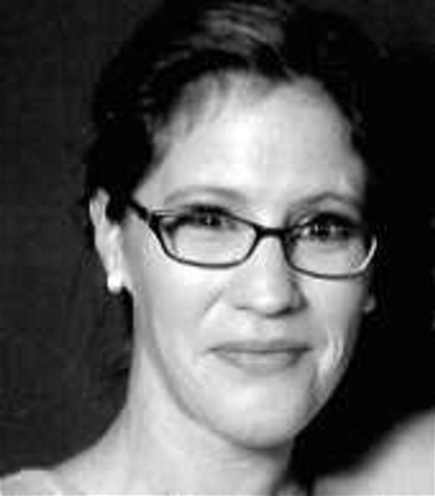 Joann M. Comuso