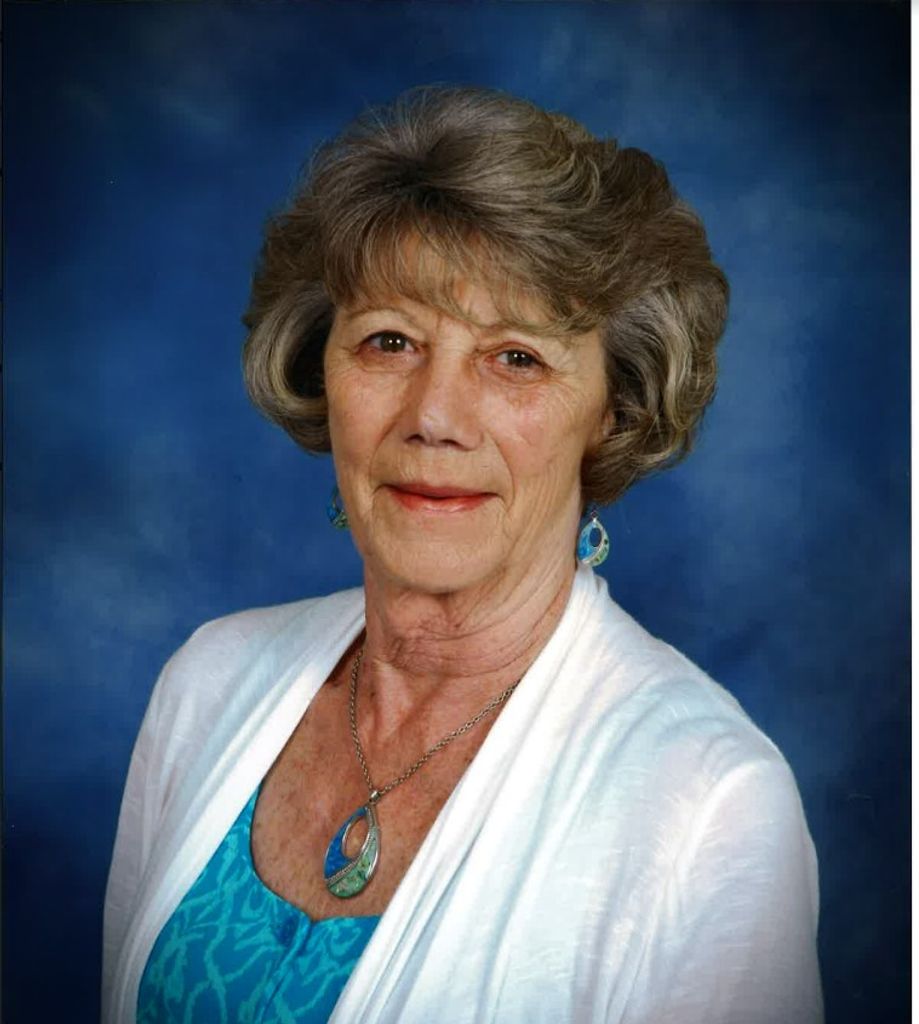 Sarah E. Cox