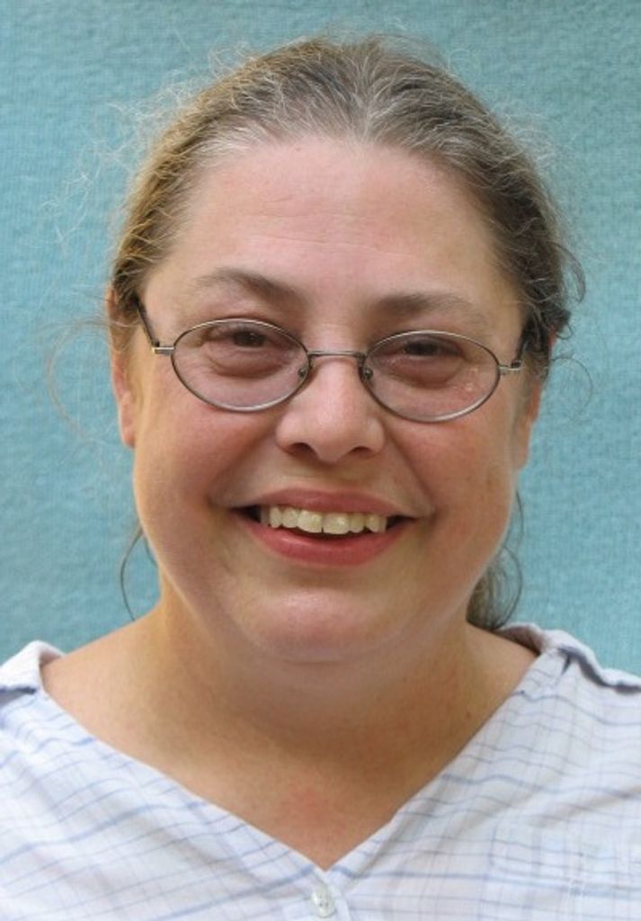 Wells, Melissa E.