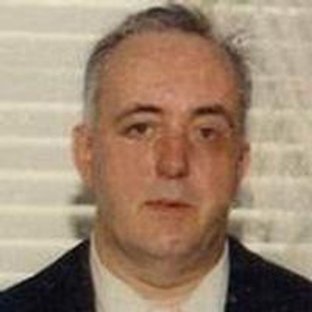 Ray  E. West