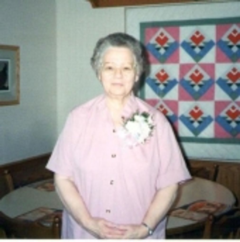 Sara R. Comer