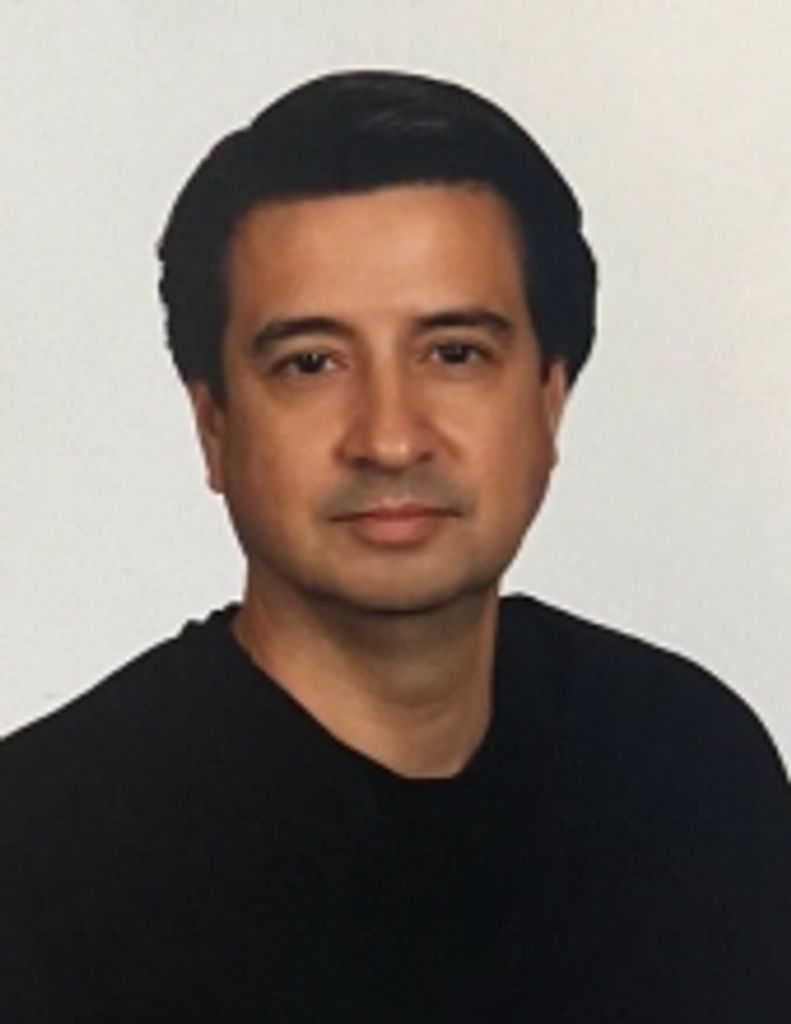 Carlos "Chuck" Guzman