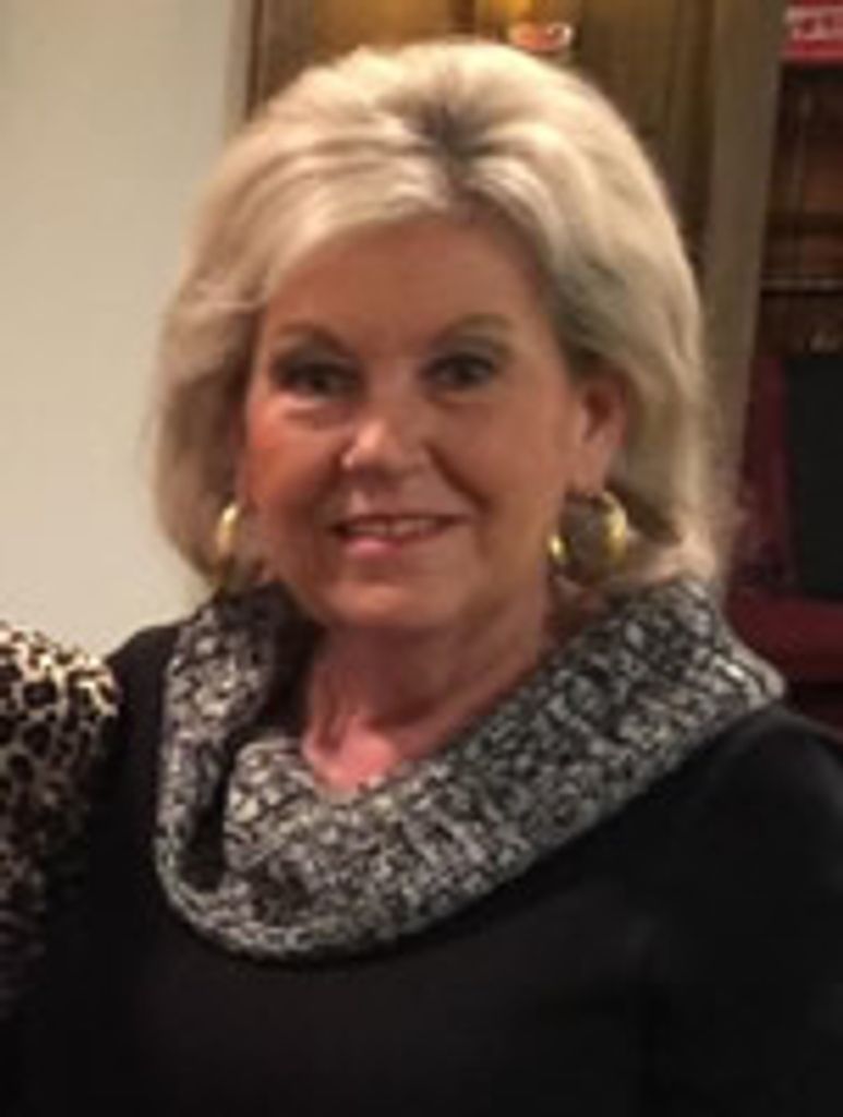 Claire E. Muller Domino