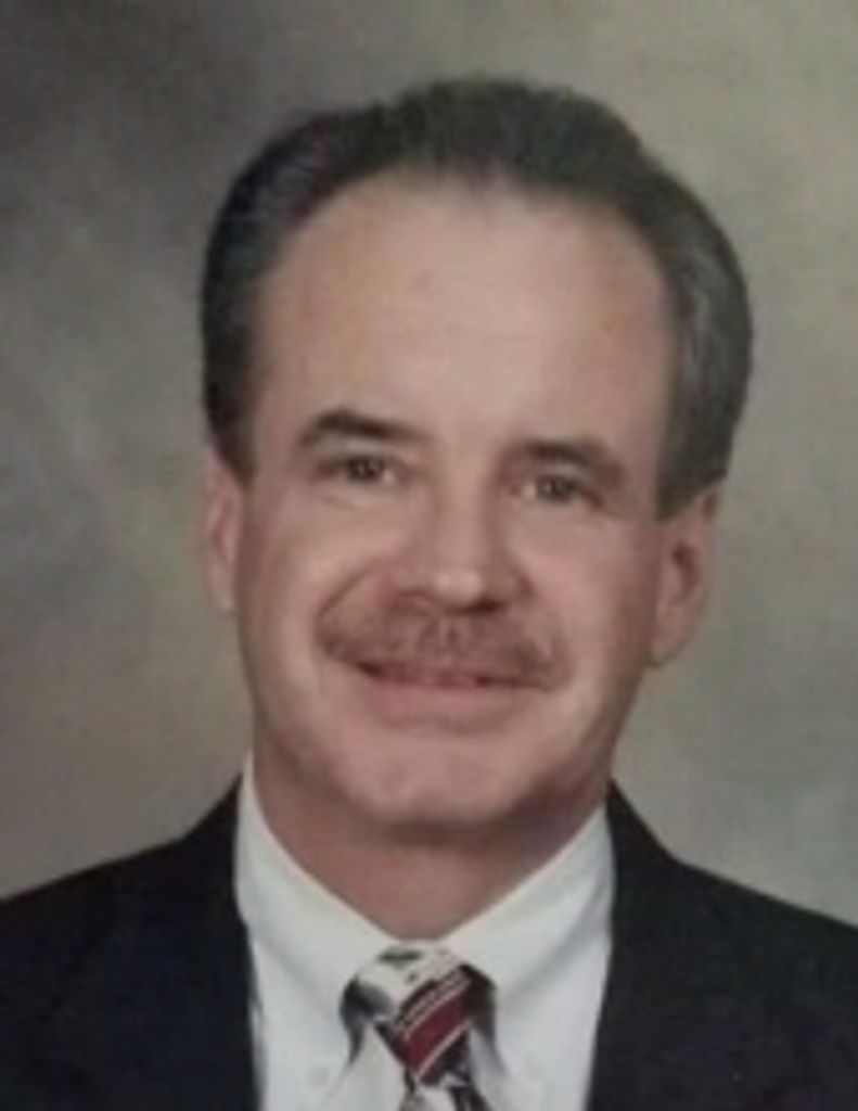 Neil M Toomey