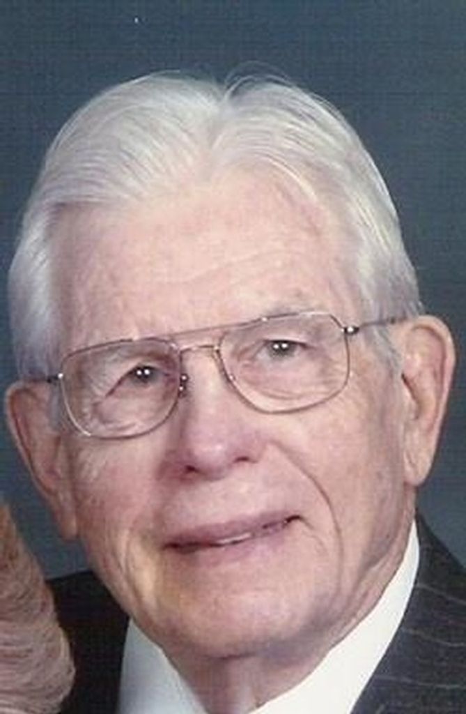 Tom G. Laster