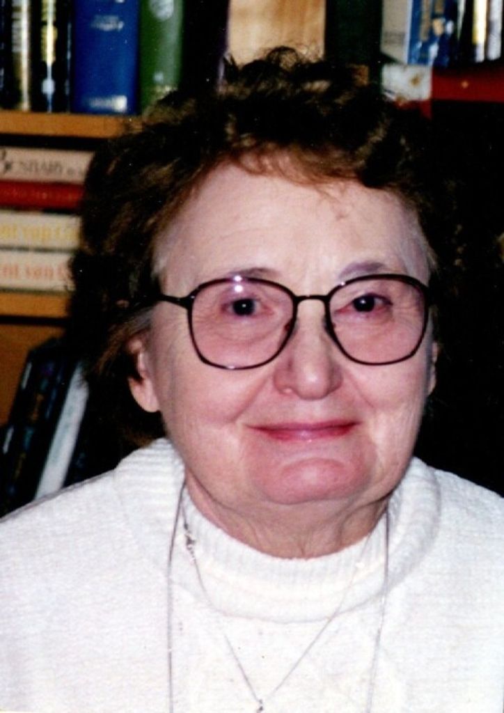 Claire T Devine