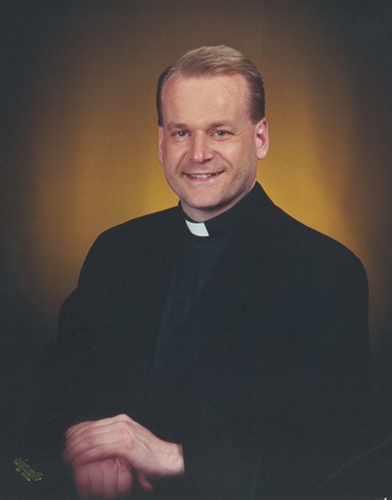 Father Marvin William Reif