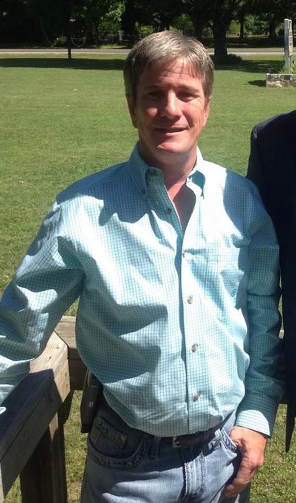 Justin E. Adkins