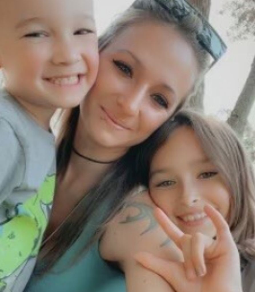 Ashley  R. (Wilson)  Postma