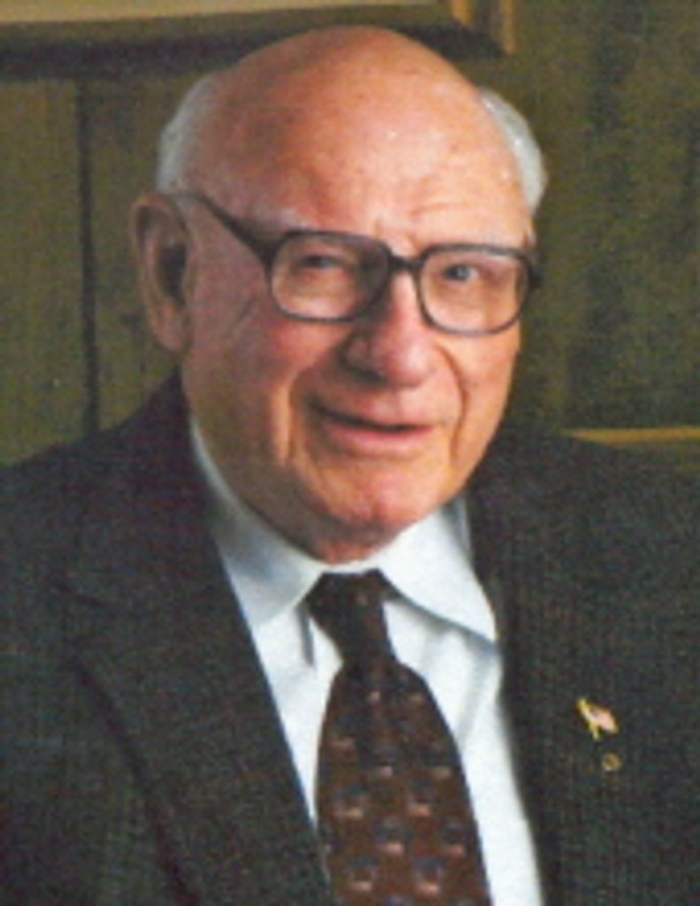 Dr. George E. Magnin